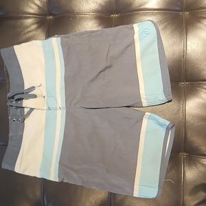 8 piece lot boys size 10/12 3 shorts, one bathing suit with tank top, 2 T-shirts